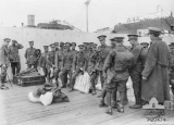 CLEMENTS EDWARD GEORGE (Troops of the 23rd Reinforcements, 8th Battalion prior to boarding HMAT Hororata (A20). A kitbag on the ground at the extreme right belongs to 6969 Pte Edward George Clements. ) 