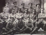 BRIGDEN STANLEY SLADE (centre row, fifth from left; group portrait of members of the 2nd Reinforcements, 1915)