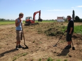  During the first excavation day, some coins and buttons were found 