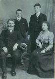 LEWIS THOMAS JOHN (on the left; his brother Sam on the right, father James and mother Leah seated)