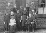 Spence Rhodes (family picture mid 1914; back row: Walter, Ada, Bert, Martha, Rhodes. middle: Annie, Annie E., Hannah, Rhoda, Robert Bell. front: Bill on his Mum's knee, Bob between his Dad's knees) 