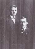 Gilligan Arthur (standing; his brother Jack seated on the right)