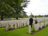 Judy (granddaughter) and her husband Des visiting the grave in 2014