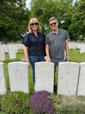 Jeff Underdown and his wife Fiona at the grave of his relative, 2026.