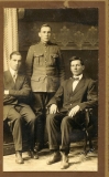 BRENNAN MARTIN (in uniform; and his two brothers)